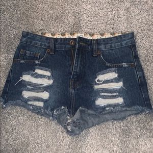 trendy high-waisted boho chic dark distressed jean shorts with holes